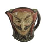 A Royal Doulton large character jug, double sided Mephistopheles, printed marks, 15cm high