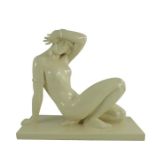 Maurice Girard, art deco ceramic sculpture, circa 1930, cream coloured sculpture of a nude lady recl