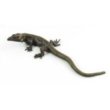 Max Le Verrier, a bronze sculpture of a lizard, circa 1925, signed Le Verrier, 25cm long.