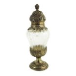 A French silver gilt and cut glass pepper pot