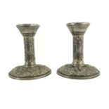 A pair of Elizabeth II silver dwarf candlesticks