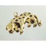 A 9ct yellow gold leopard pendant