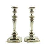 A pair of George III Old Sheffield Plate candlesticks