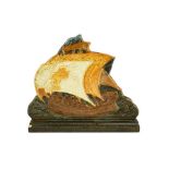 A Continental art pottery relief moulded sculpture