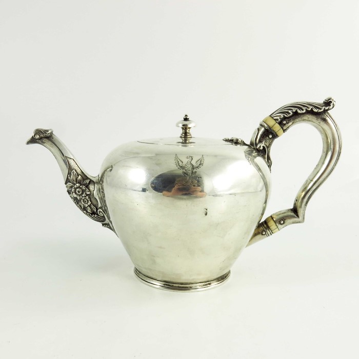 A mid 18th century Scottish provencial silver teaport, circular shape, floral decoration to the spou - Image 3 of 6