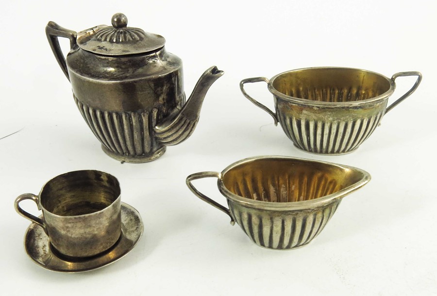 A George V silver miniature tea set, Cornelius Desormeaux Saunders & James Francis Hollings (Frank) - Image 4 of 4