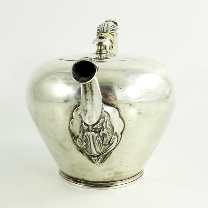 A mid 18th century Scottish provencial silver teaport, circular shape, floral decoration to the spou - Image 5 of 6