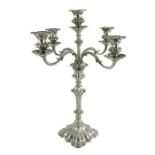 A Victorian silver plated four branch, five light candelabrum