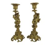 A pair of 19th century gilt broze candlesticks