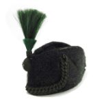 Rifle Brigade Other Ranks busby cap, late 19th century, black cloth crown with appliqued cord figure