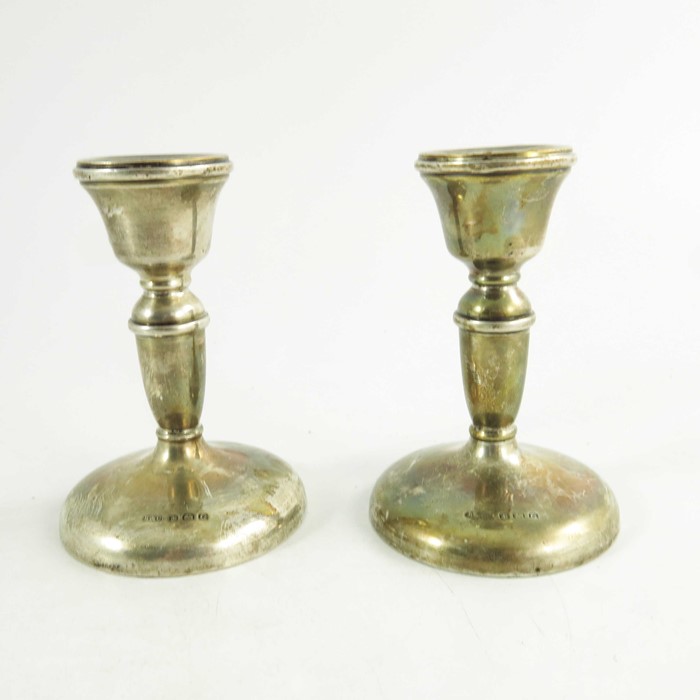 A pair of George V silver dwarf candlesticks