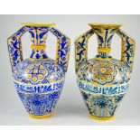 A near pair of Middle Eastern glased ceramic two handled ewers