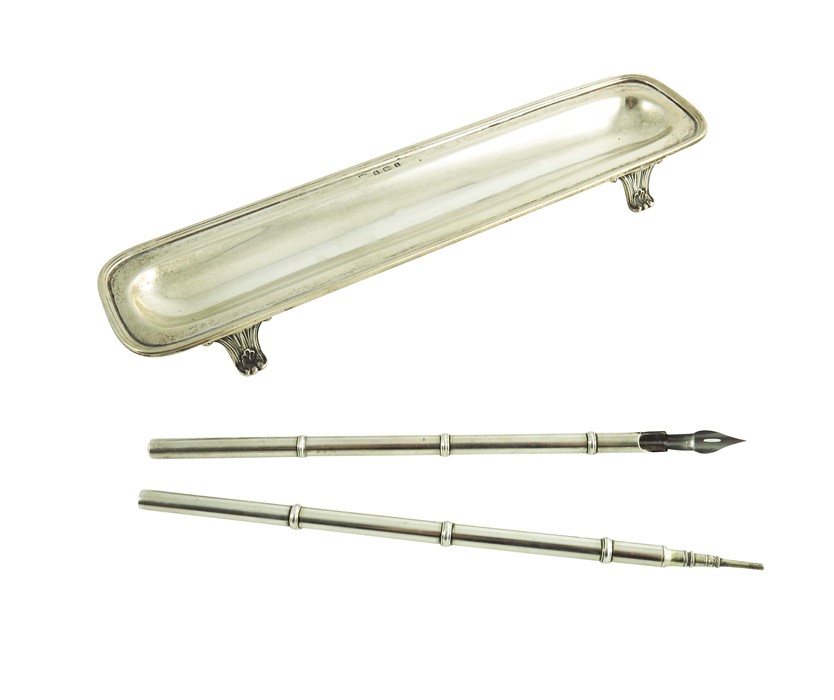 An Edwardian silver pen tray and two silver pens, Ellis and Co