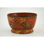 A pre-Columbian earthenware bowl, footed form, painted with wild animals, 16.5cm wide