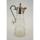 A Victorian silver plate and cut glass claret jug