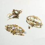 Three Arts and Crafts gold and gen set brooches