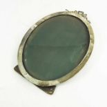 A George V silver oval photo frame,