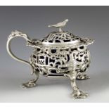 John Figg, London 1842, a Victorian silver mustard pot in the Chinoiserie style, ovoid form, cast an