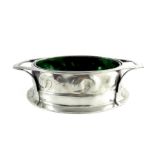 Oliver Baker for Liberty and Co., a Tudric pewter and green glass lined centrepiece bowl