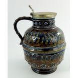 A Doulton Lambeth stoneware lidded jug