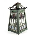 An Arts and Crafts copper and stained glass pendant light fitting