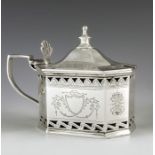 Martin Goldstein, London 1882, a Victorian silver mustard pot, octagonal section bright cut and reti