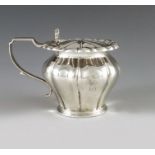 Charles Reily and George Storer, London 1830, a William IV silver mustard pot, ogee lobed inverse pe