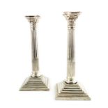 A pair of large silver plated candlesticks