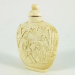 λ A Chinese carved ivory snuff bottle