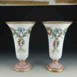 A pair of Baccarat enamelled opaque glass vases