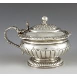 William Eaton, London 1821, a George IV silver mustard pot, squat oboid footed form with everted and