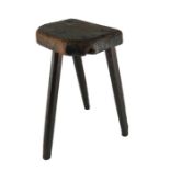 A vernacular three legged cutlers stool