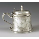 Thomas H Stone, Exeter 1872, a Victorian Provincial silver mustard pot, flared conical form, bright