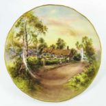 H. Sivad (Harry Davis) for Royal Worcester, a hand painted and gilded cabinet plate