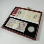A Royal Mint 10 pound note and silver proof 5 pound coin set