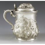 Charles Boyton, London 1854, a Victorian silver mustard pot, baluster lidded mug form, embossed and