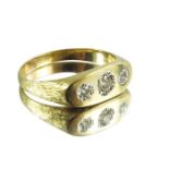 A Gentleman's 18ct yellow gold three stone diamond ring