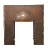 An Arts and Crafts copper fire surround