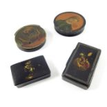 A collection of papier mache snuff boxes
