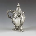 Henry Wilkinson and Co., Sheffield 1848, a Victorian silver mustard pot, heavily embossed fluted oge