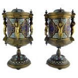 A pair of French gilt and champleve enamelled pedestal cencers or vases