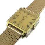 An Omega De Ville gents wristwatch on 9 carat gold strap