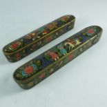 Two black laquered pen cases, painted with horse, birds and figures