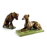 Two Minton majolica dog figures, circa 1890, modelled as a whippet and another, raised marks, 13.5cm