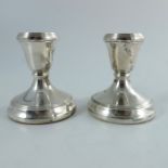 A matched pair of Elizabeth II silver dwarf candlesticks