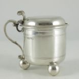 George Fox, London 1875, a Victorian silver mustard pot, beaker form, on three spherical feet, the b