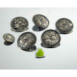 A collection of Arts and Crafts silver and white metal buttons