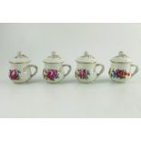 Four Continental chocolate pots and covers, in the Meissen style