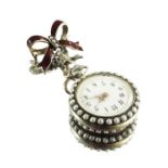 An enamel and pearl open face pocket watch/brooch