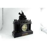 A 19th century black slate and bronze mounted mantle clock